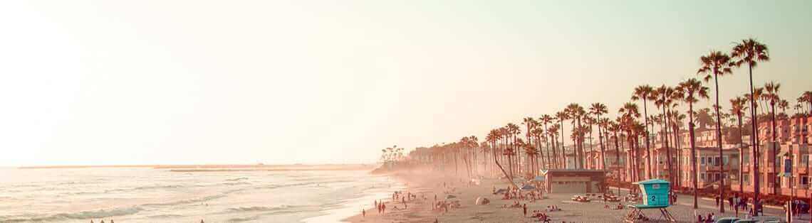 California beach scene highlighting the sunny environment that raises the question: Does solar make sense in California.
