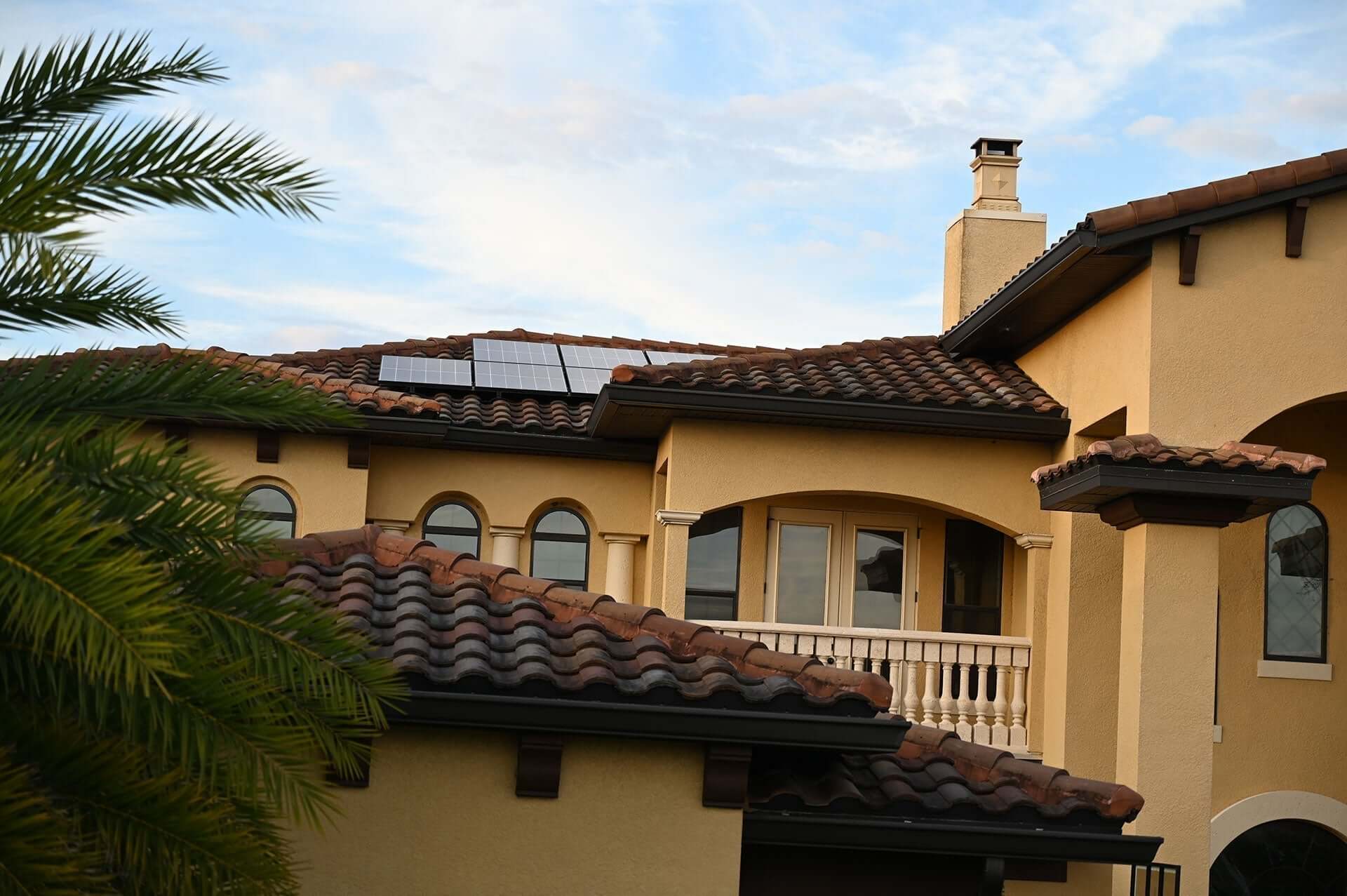 So Cal Edison hits home solar with a rate change featuring solar panels on a modern home roof.
